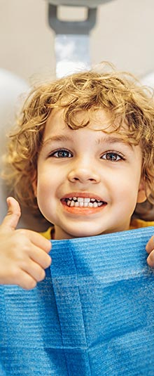 https://www.dentistenapierville.com/wp-content/uploads/2025/07/accueil-sourire-enfant.jpg